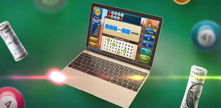 a laptop with lottery game running onscreen